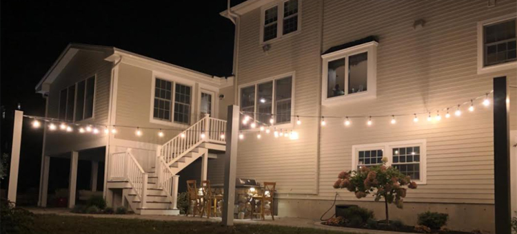 Patio with string lights above